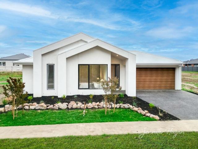 A Premium Move In Ready New Home in a Quiet, Tree Lined Pocket of Drouin