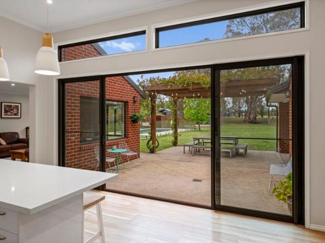 A Private Country Style Estate on a Large Block Opposite the Golf Course, with Orchard, Shedding, Pool & Plenty of Room