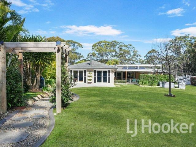 A Private Coastal Oasis with Exceptional Versatility