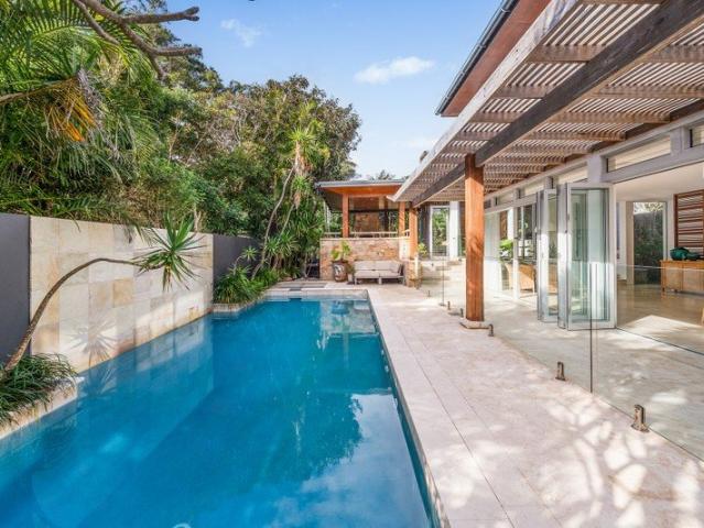 A Private Coastal Sanctuary Crafted for Family Living and Entertaining