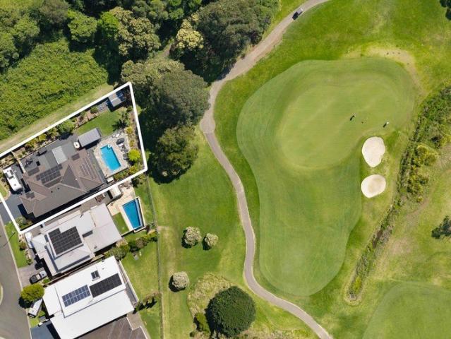 A Private Coastal Sanctuary with Golf Course Views & Exceptional Entertaining