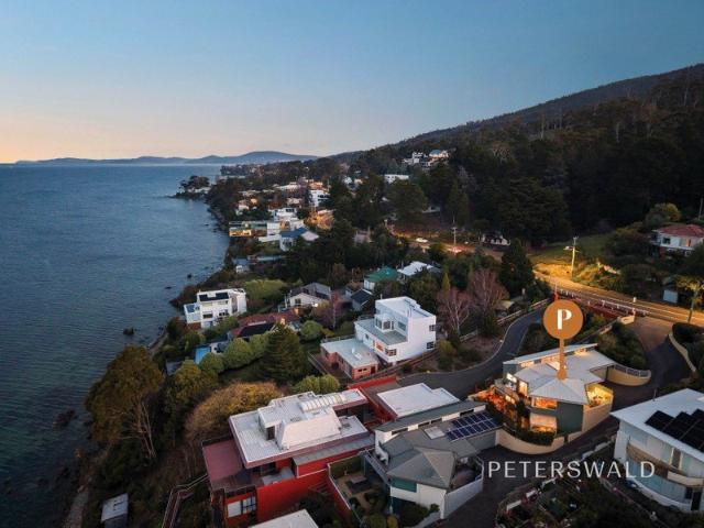 A private coastal sanctuary with panoramic river views