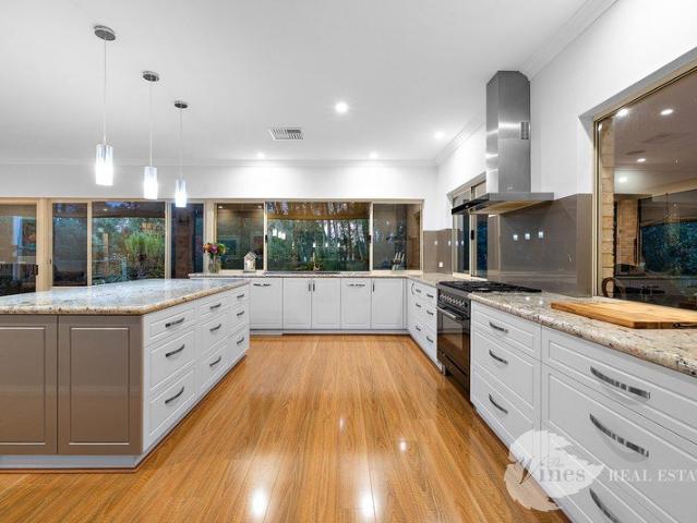 A Private Acreage with Dual Living!