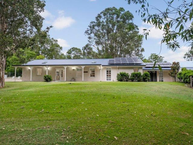 A Private Acreage Address with Polished Family Luxury