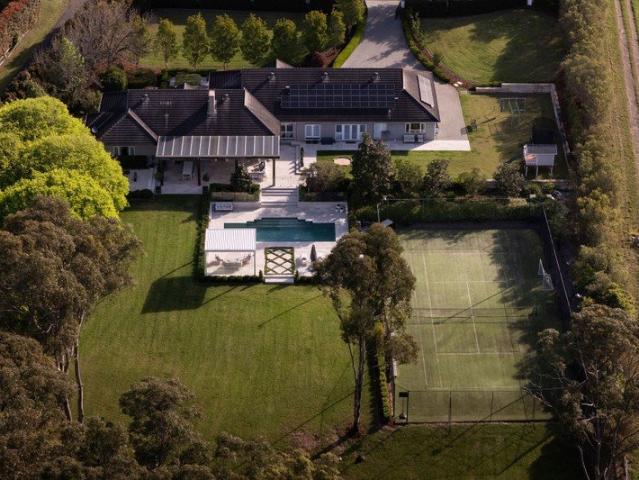 A Private Acreage Estate Designed for Family Living
