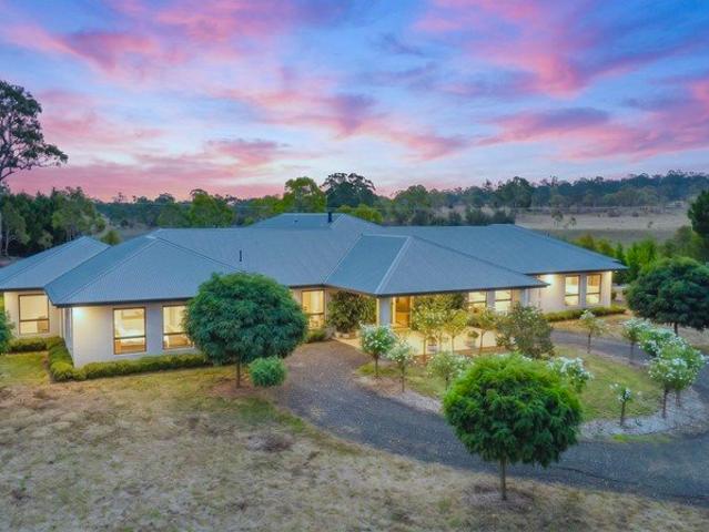 A Private Acreage Estate of Architectural Scale & Refined Living