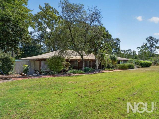 A Private Acreage Retreat of Timeless Appeal