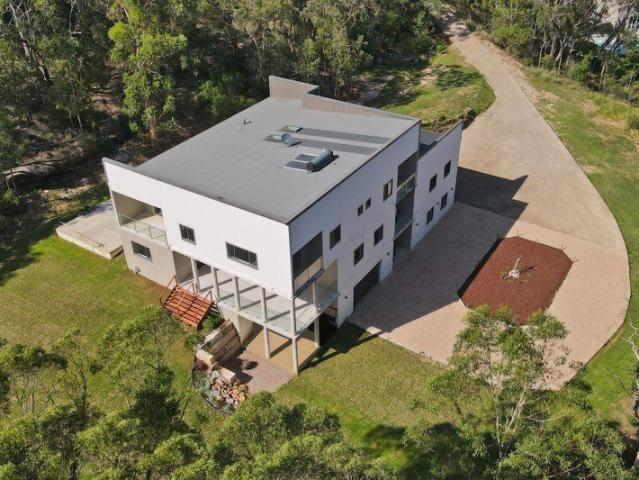 A Private Acreage Retreat Designed for Grand Family Living