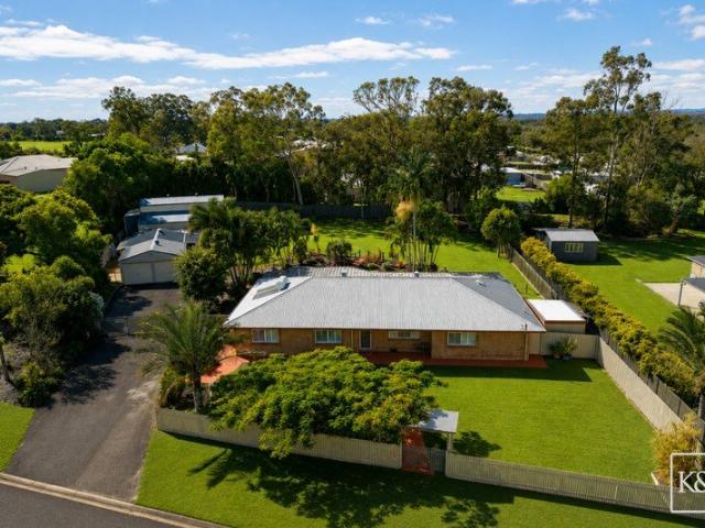A Private Acreage Retreat with Exceptional Vehicle Accommodation