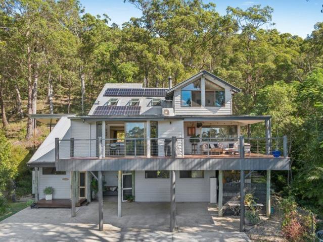 A Private Acreage Sanctuary Moments from the Coast