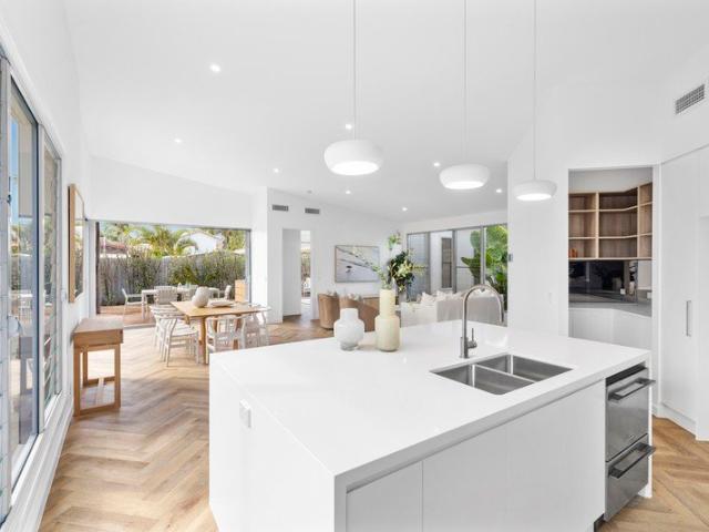 A Private Beachside Sanctuary of Scale, Sophistication & Timeless Luxury
