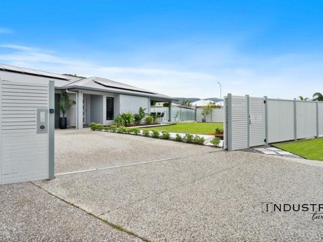 A Private, Gated Dual Living Residence with Poolside Luxury in Trinity Beach
