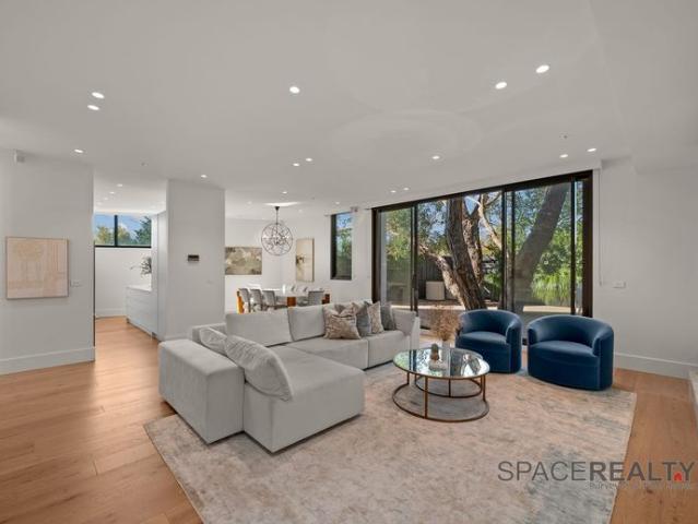 A Private Garden, Four Bedrooms, and a Skyline View. In Toorak