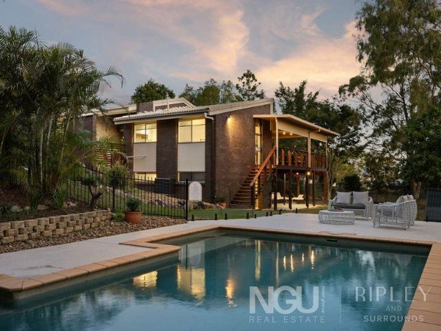 A PRIVATE FAMILY OASIS ON OVER HALF AN ACRE, MINUTES FROM IPSWICH CBD