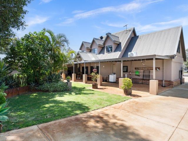 A PRIVATE FAMILY OASIS WITH ROOM FOR EVERYONE