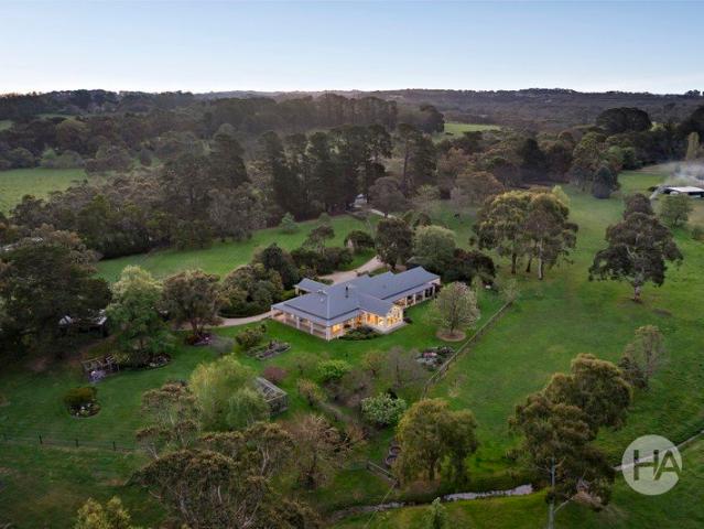 A Private Merricks North Acreage with Country Soul