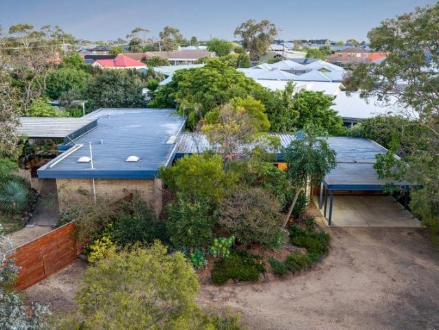 A Private Sanctuary on Almost Half an Acre
