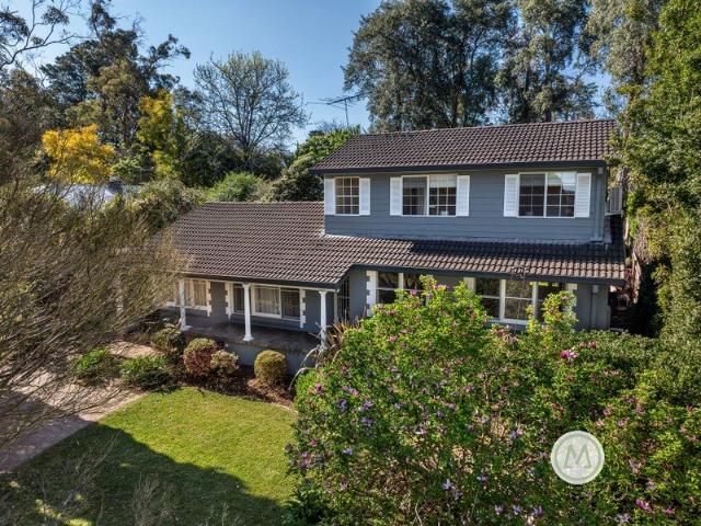 A PRIVATE SPRINGWOOD SANCTUARY WITH CHARACTER, SPACE & SOUL!