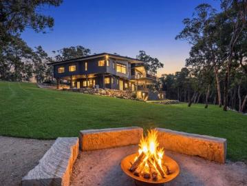 A Private Riverfront Estate of Rare Scale and Soul!
