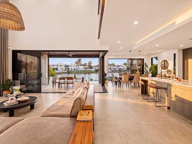 A Private Waterfront Haven Designed for Family Living & Entertaining