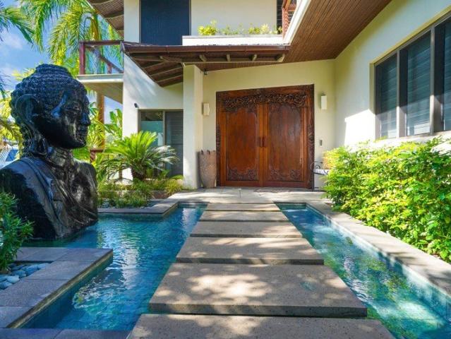 A Private Waterfront Masterpiece in the Heart of Cullen Bay