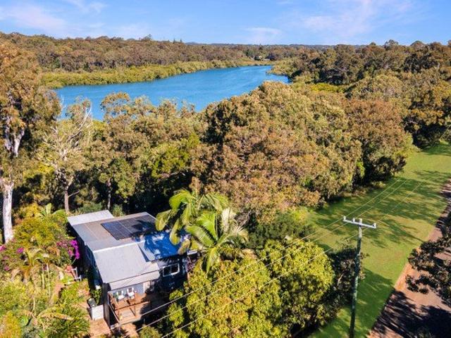 A Private Waterfront Retreat Among the Trees