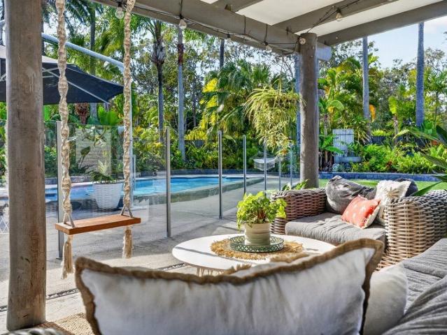 A PRIVATE TROPICAL RESIDENCE WITH GUEST HOUSE ON ALMOST AN ACRE