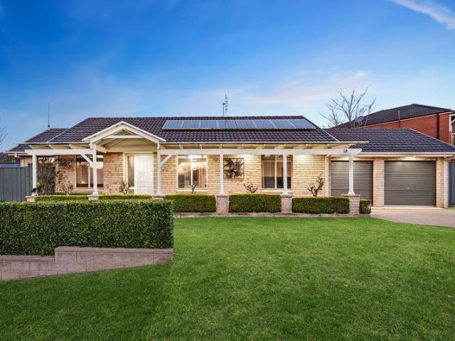 A Prized Garden Setting with Outstanding Entertaining!