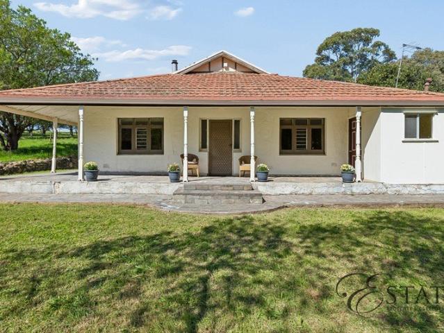 A Rare 6.32 Acre Opportunity Character, Land & Potential