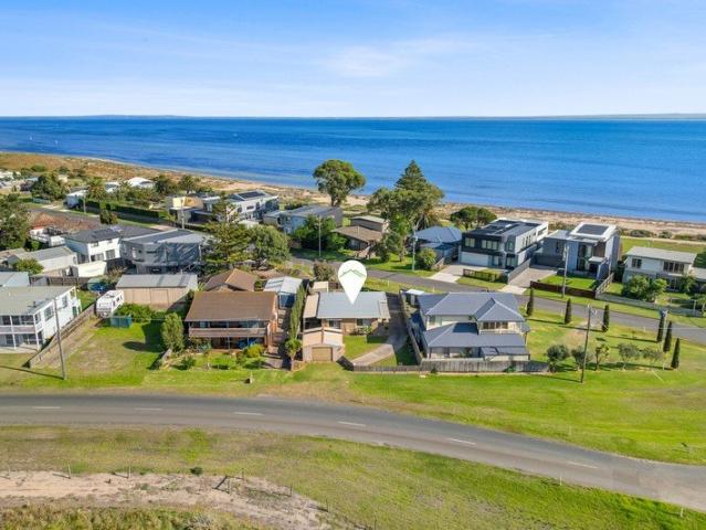 A Rare Coastal Holding with Dual Access and Endless Potential