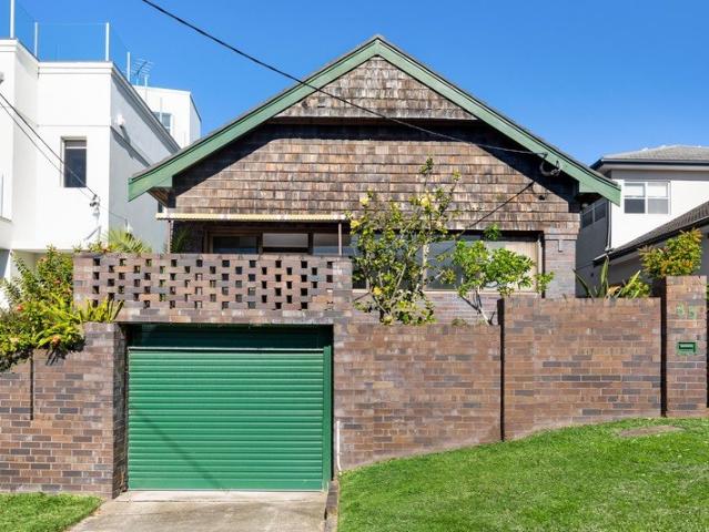 A Rare Coastal Offering with Water Views and Exceptional Potential