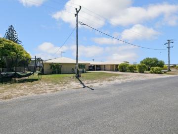 A RARE COASTAL OPPORTUNITY WITH TWO HOMES ON ONE TITLE