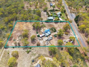 A Rare Coastal Retreat Opportunity in a Sought After Peninsula Setting