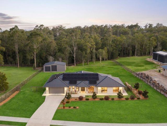 A rare combination of family comfort, usable acreage and outstanding shed infrastructure in one of Karalee's most tightly held lifestyle locations