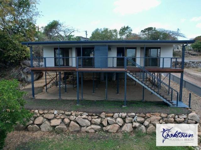 A Rare Cooktown Investment High Set Mirrored Duplex