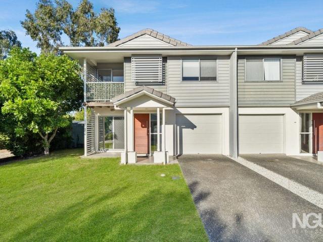 A Rare Corner Townhouse Offering House Sized Living, an Oversized Yard & Exceptional Space