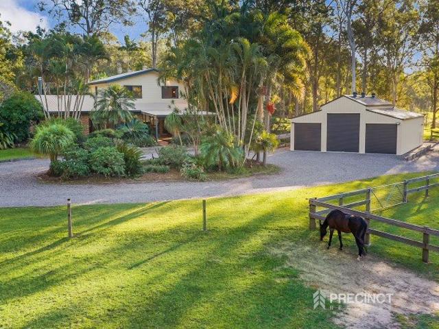 A rare acreage offering both Equestrian lifestyle and development potential