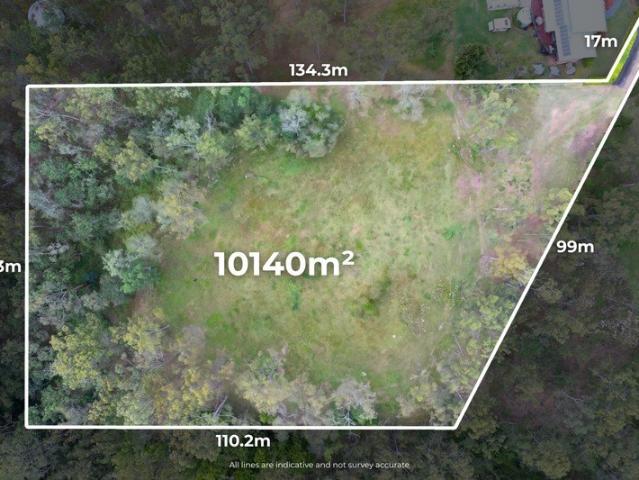 A RARE ACREAGE OPPORTUNITY WITH APPROVED PLANS