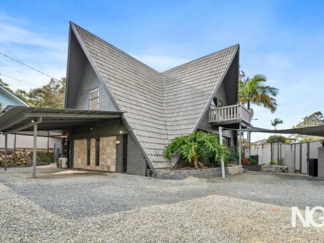 A Rare Architectural Statement Your chance to own one of Logan's landmarks
