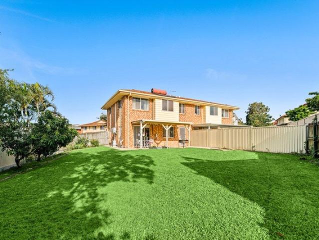 A Rare Backyard Find Spacious, Secure & Family Friendly Townhouse Living