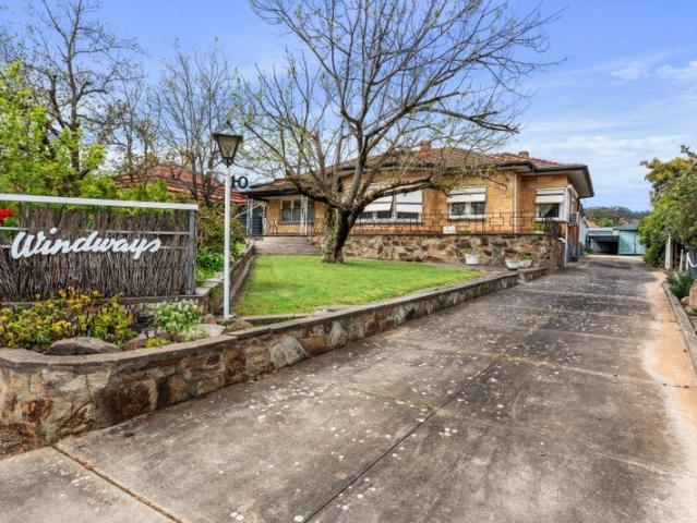 A Rare Basket Range Home with Character, Views & 1,509m2 Block