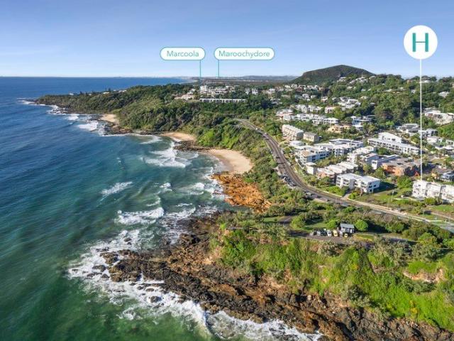 A Rare Beachfront Opportunity with Ocean Views & Endless Potential