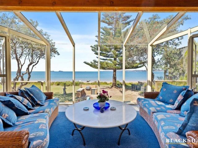 A Rare Beachfront Opportunity with glorious Ocean and Tollgate Island Views
