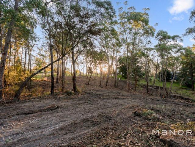 A Rare Blank Canvas in a Prestigious Acreage Setting