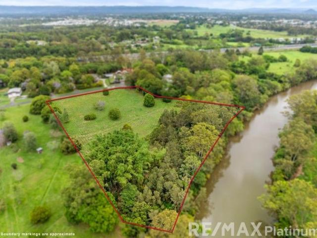 A Rare Blend of Space, Privacy and Potential 5.5 Acres & A Blank Canvas