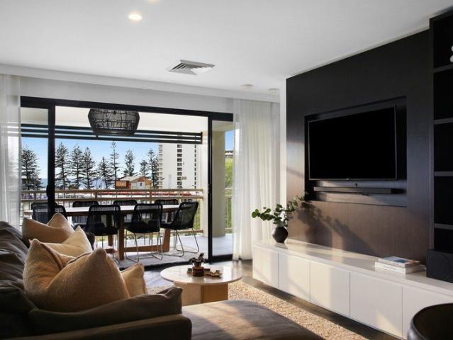 A Rare Burleigh Beachside Apartment with Premium Finishes, Three Car Spaces & Ocean Views
