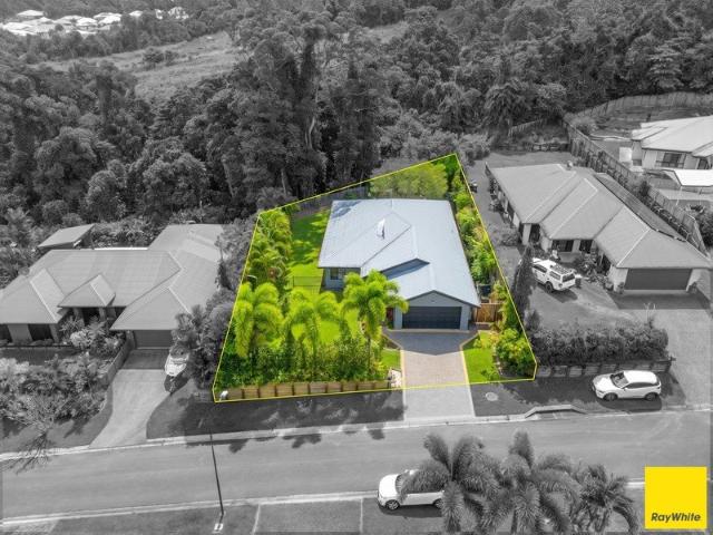 A Rare Five Bedroom Family Home on 921m² Backing Onto Rainforest