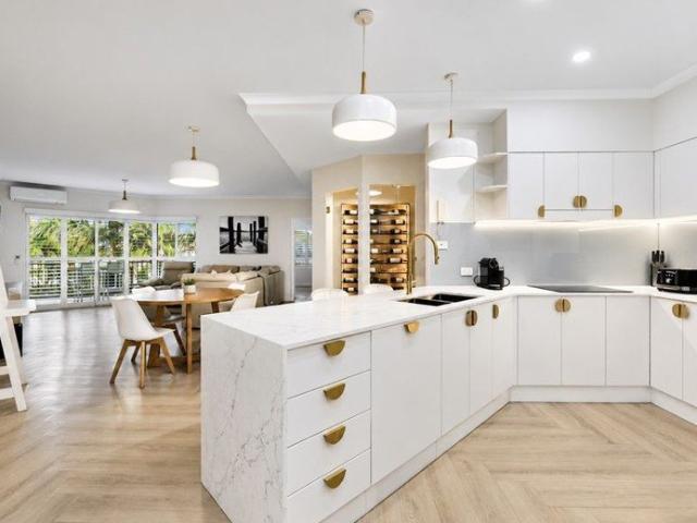 A Rare Find! Stunning Two Level Residence with Skyline Views & Bespoke Entertaining Bar