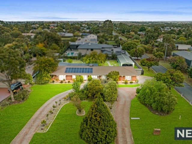 A Rare Half Acre Lifestyle Opportunity in Prestigious Brookfield