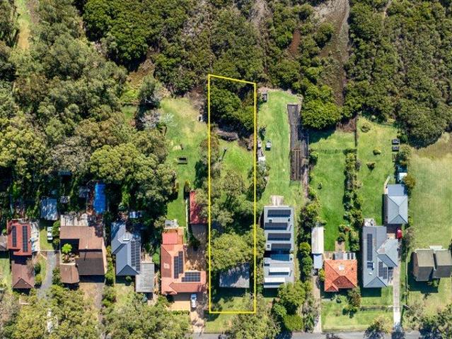 A Rare Offering in a Peaceful Bayside Setting
